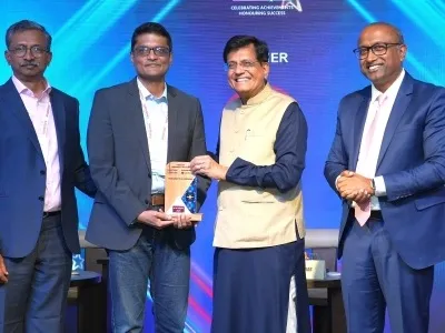 Open Weaver receiving an award from Shri Piyush Goyal at a NASSCOM event